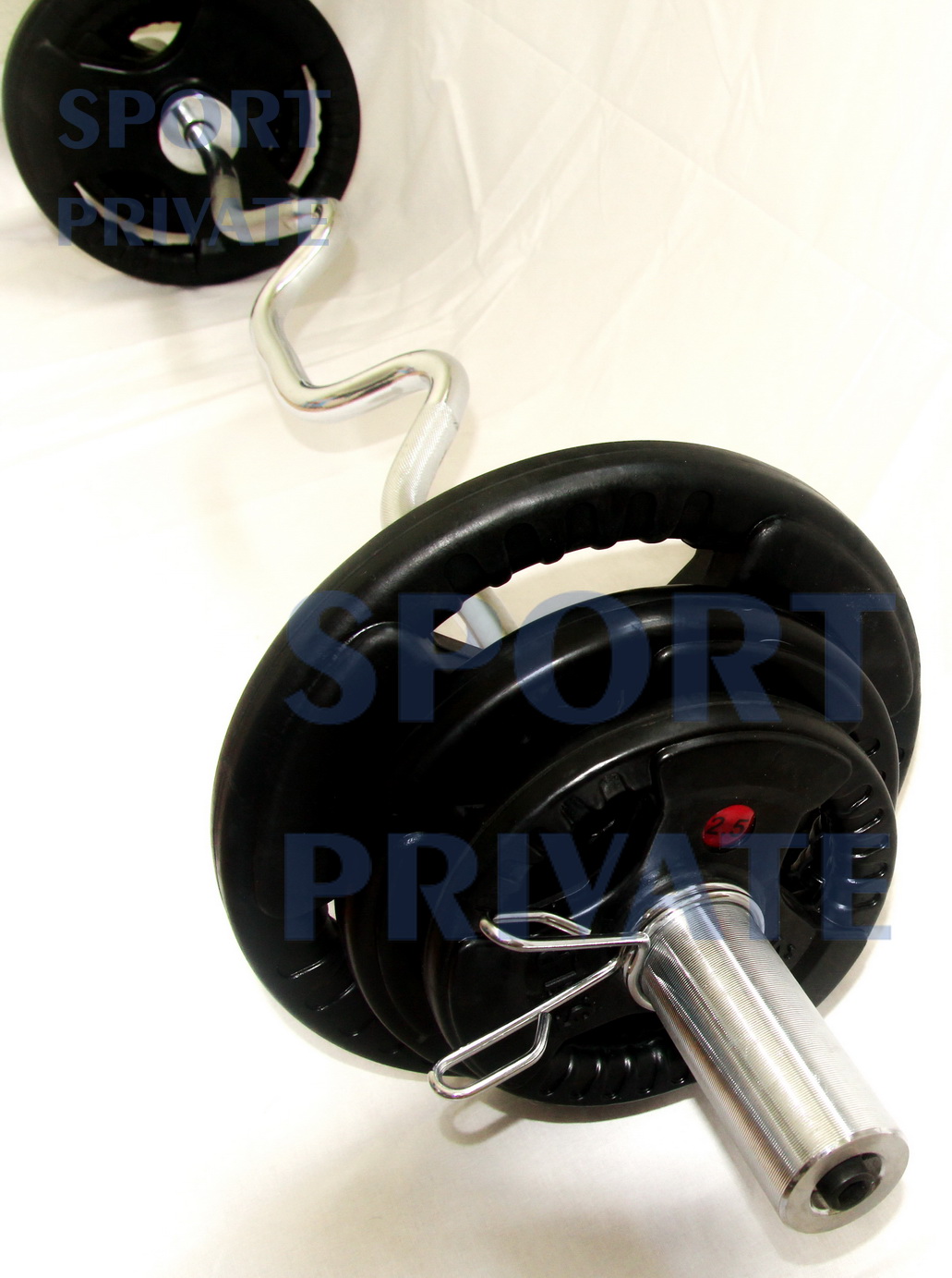 Штанга W образная. Прорезиненная. Вес 45 кг.